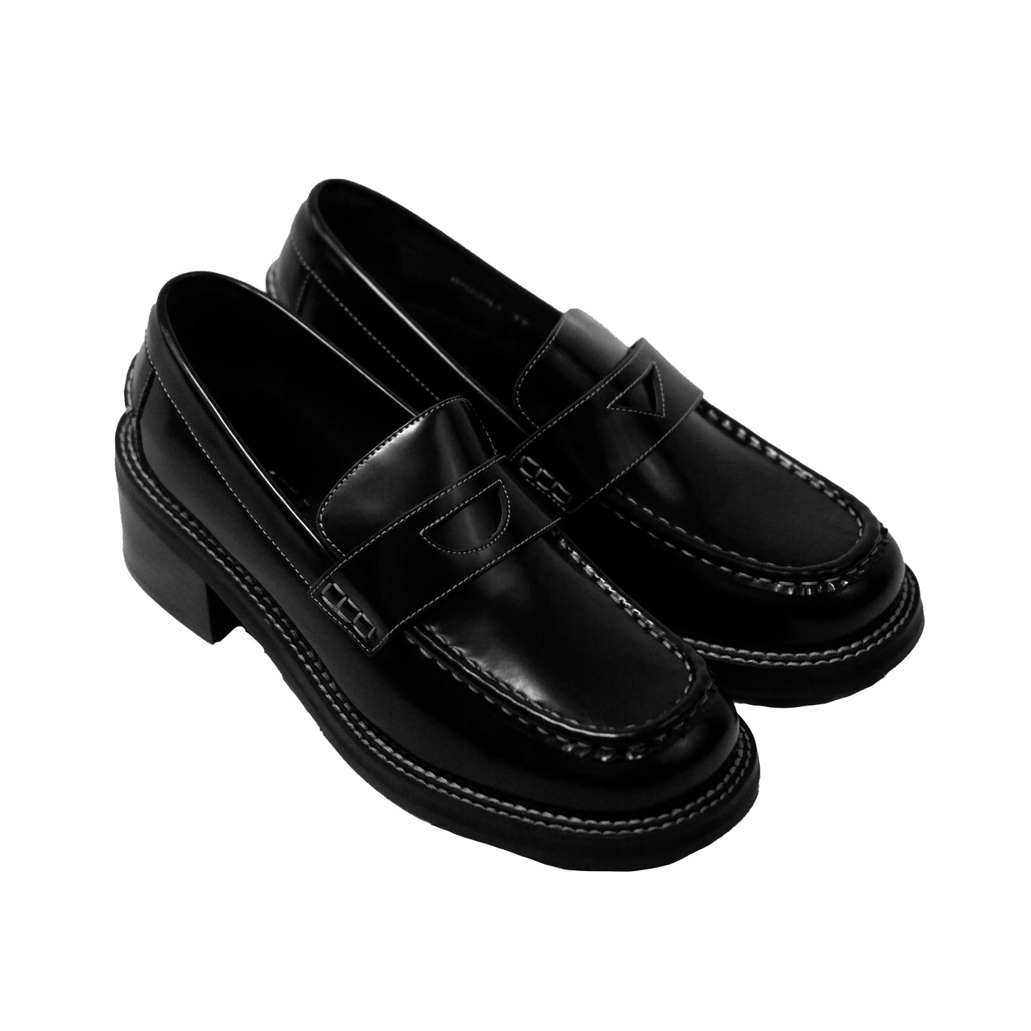Side view of a pair of black leather loafer heels with asymmetric details for women.