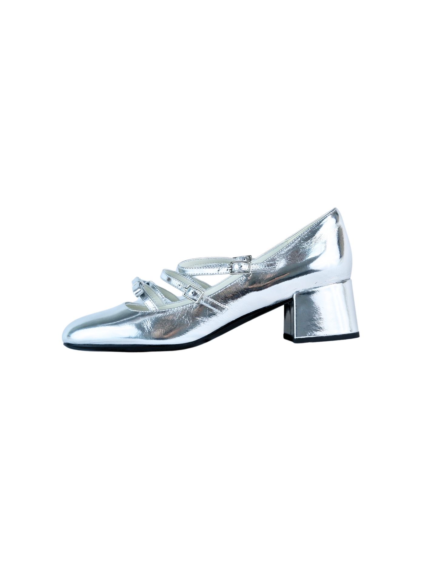 Metallic silver Mary Jane heels with triple asymmetric straps and block heel.