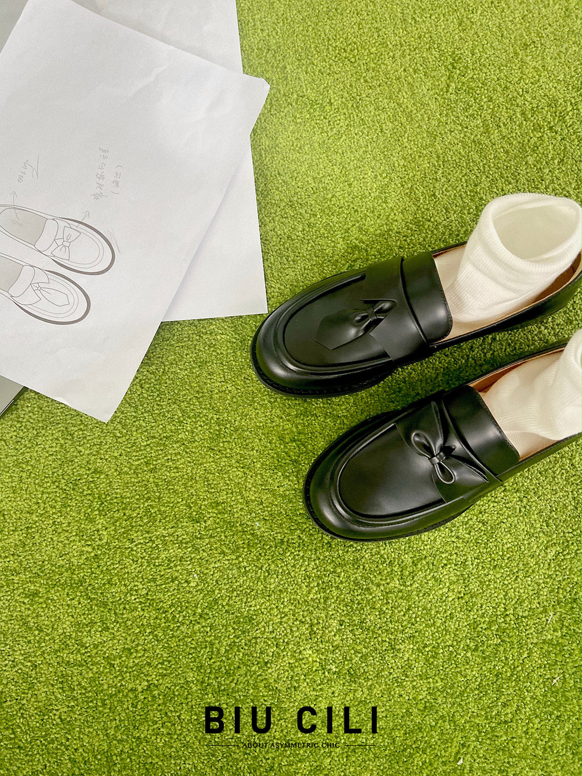 "Paradox Loafer" Women's Asymmetric Leather Loafers in Black with Bow and Tie Detail