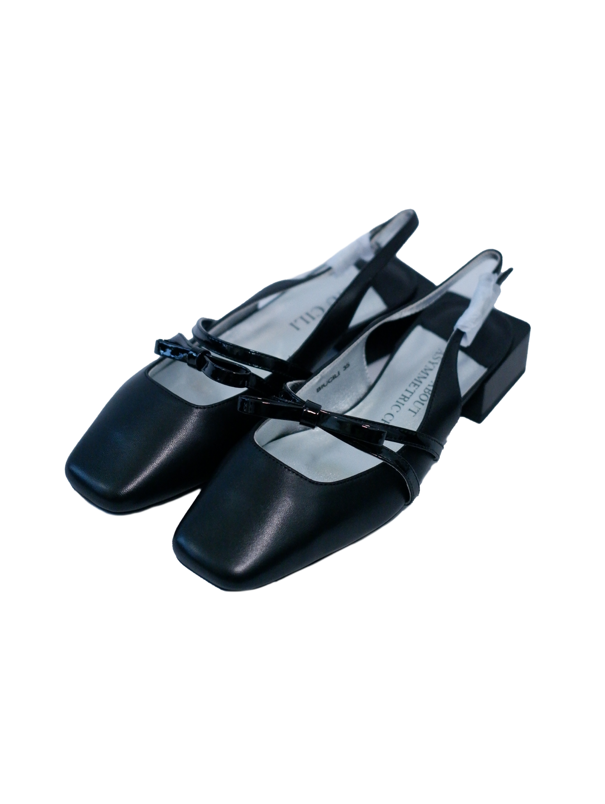 Black square toe Mary Jane shoes with asymmetric bow and low block heel
