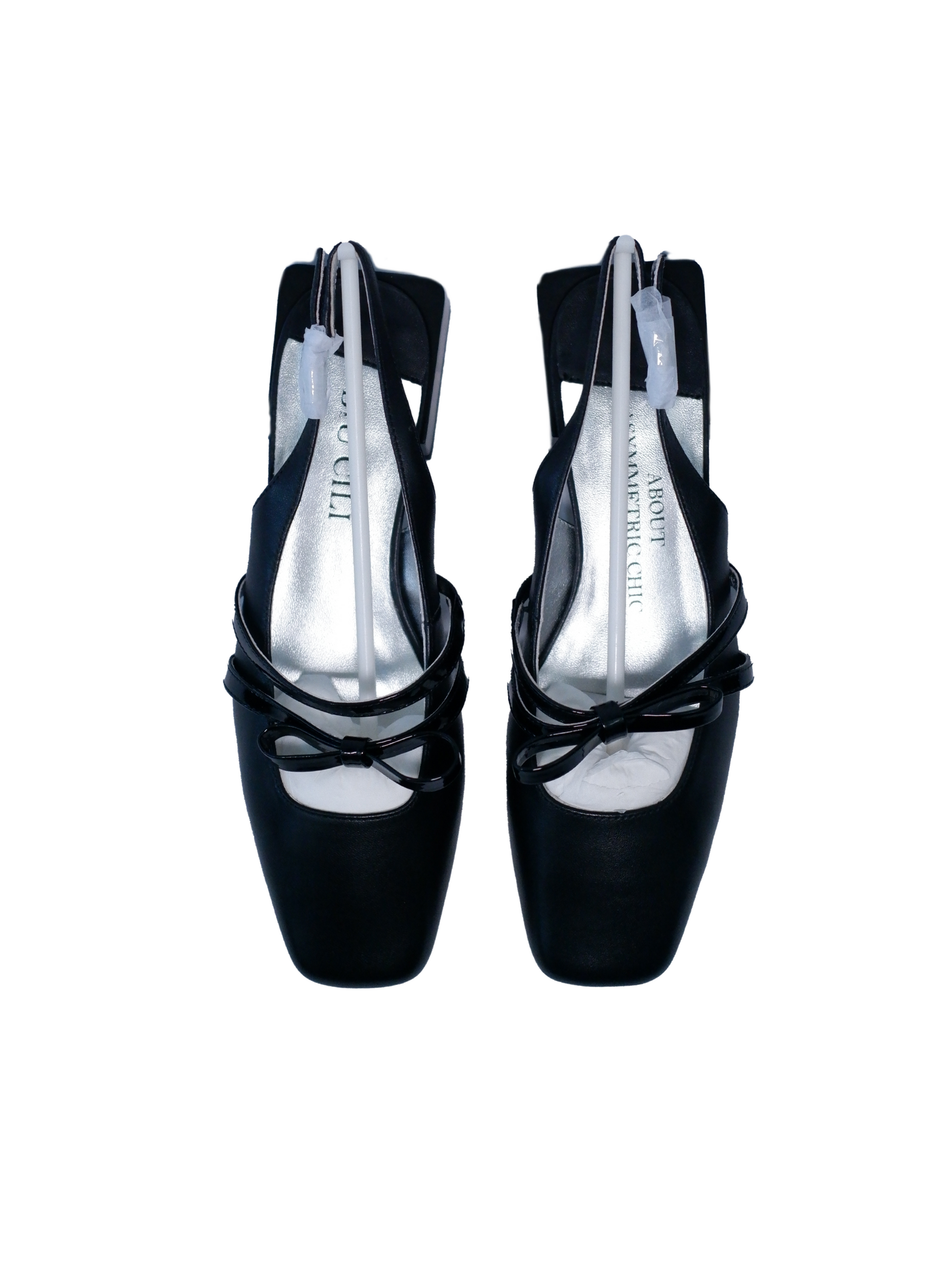 Black square toe Mary Jane shoes with asymmetric bow and low block heel