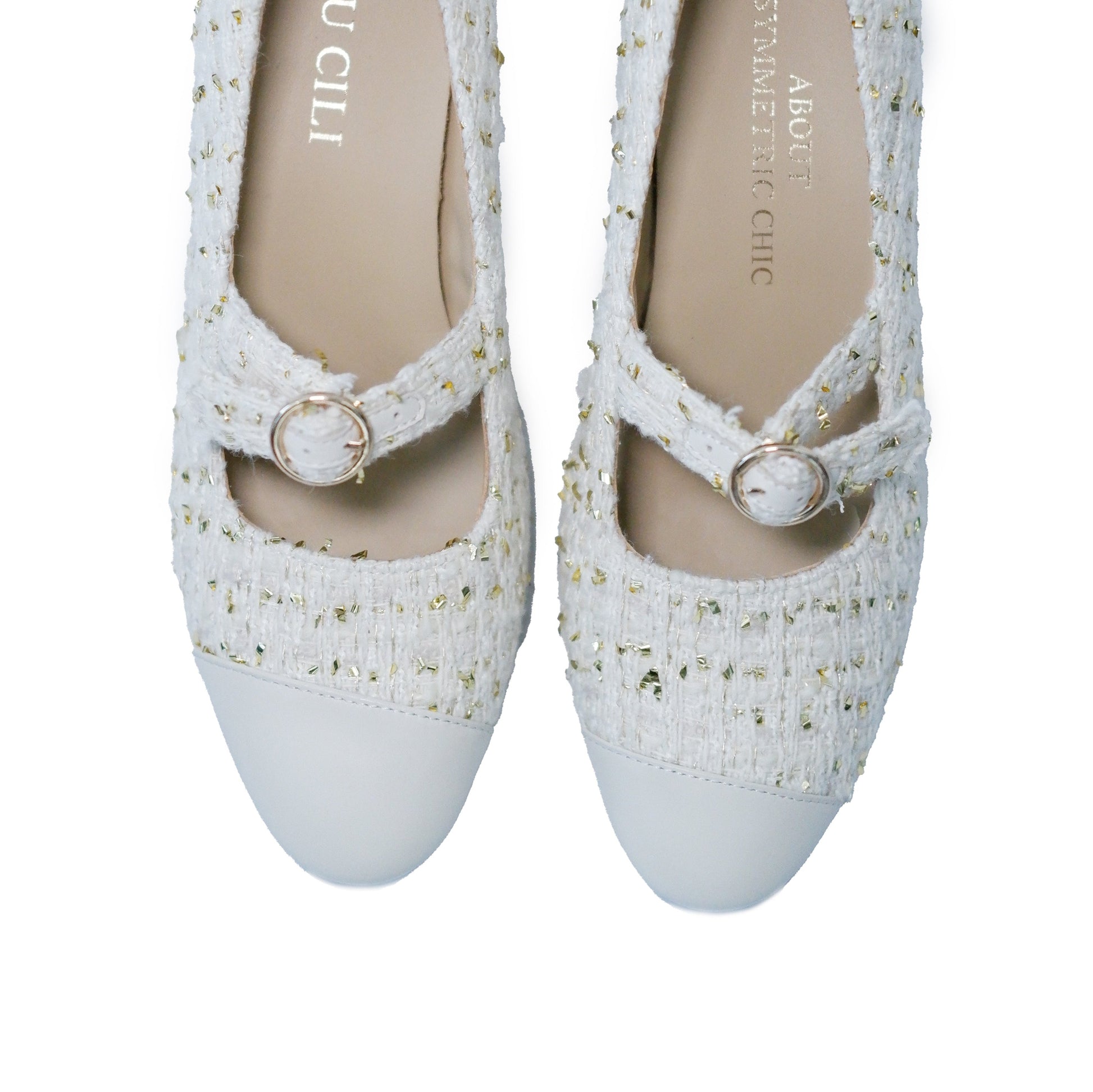 Stylish white Mary Janes Heels featuring leather tweed design with asymmetric details and a mid block heel