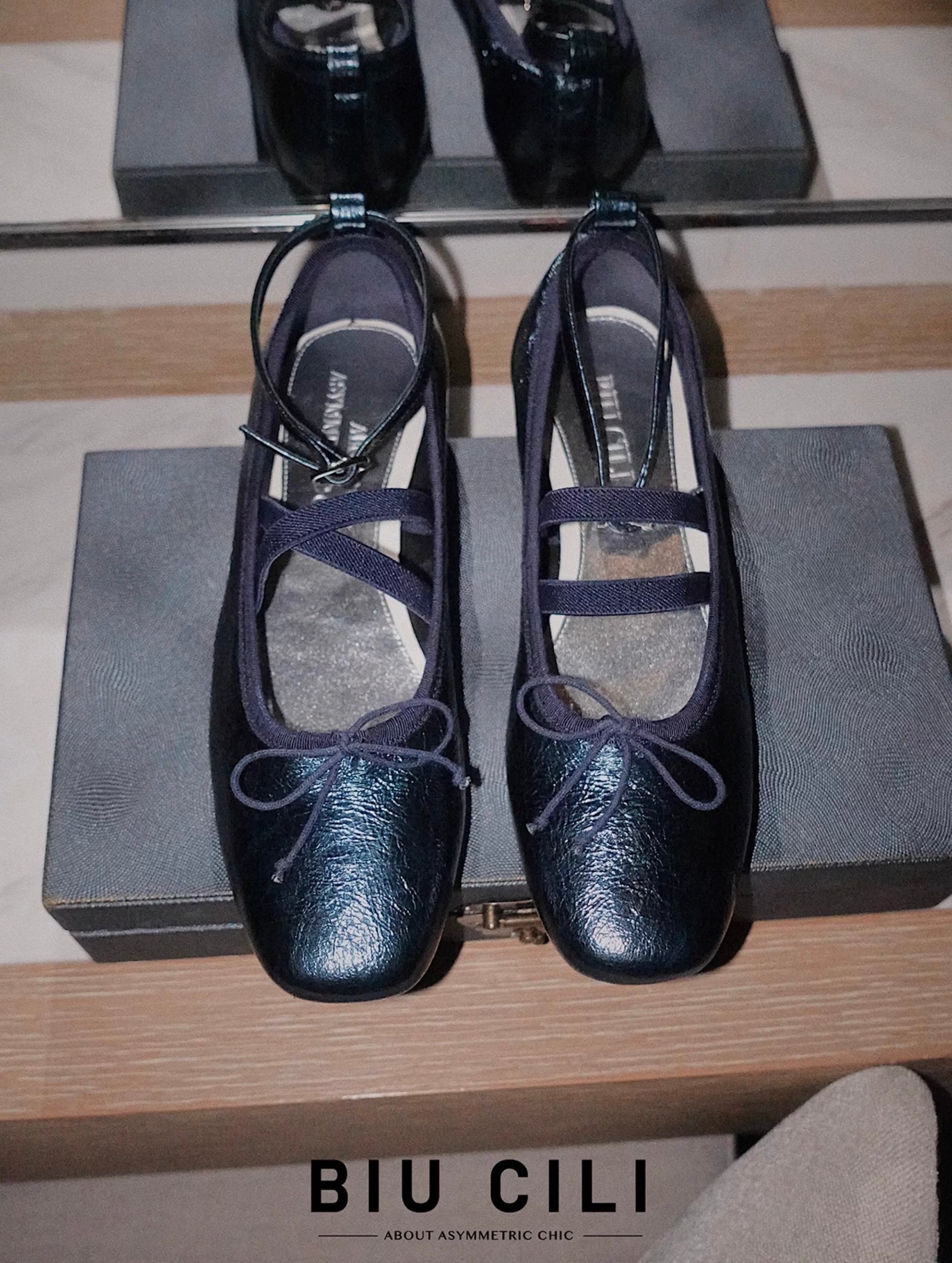 navy metallic leather Mary Jane ballet flats with asymmetrical cross straps