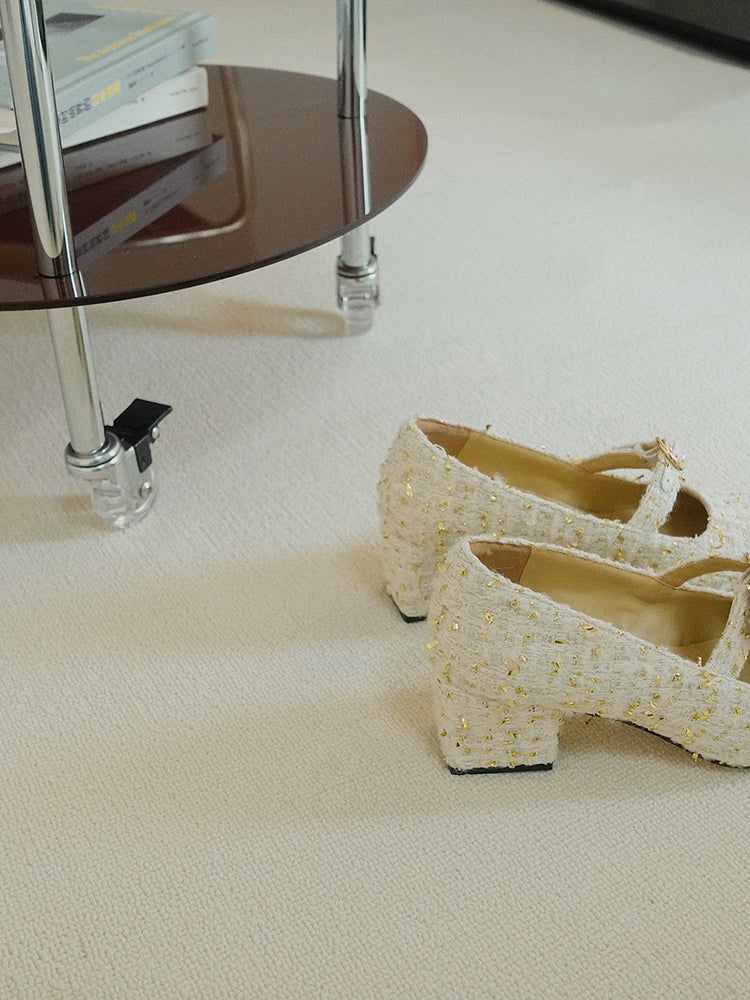 Stylish white Mary Janes featuring leather tweed design with asymmetric details and a mid block heel