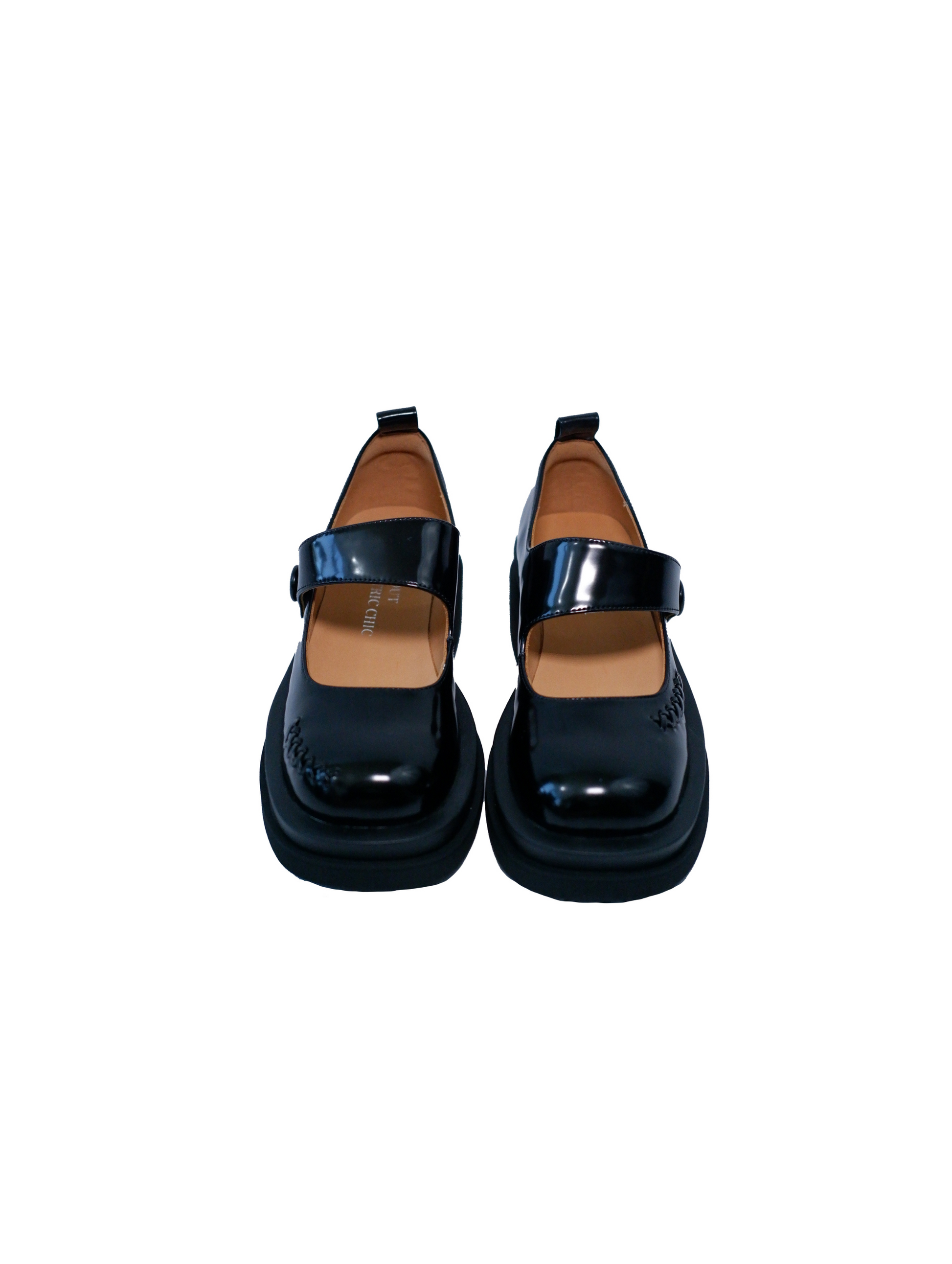 Showing the upper front view of a shiny-finish black platform Mary Jane shoes with wide strap and low block heel, with stitching details at the front side